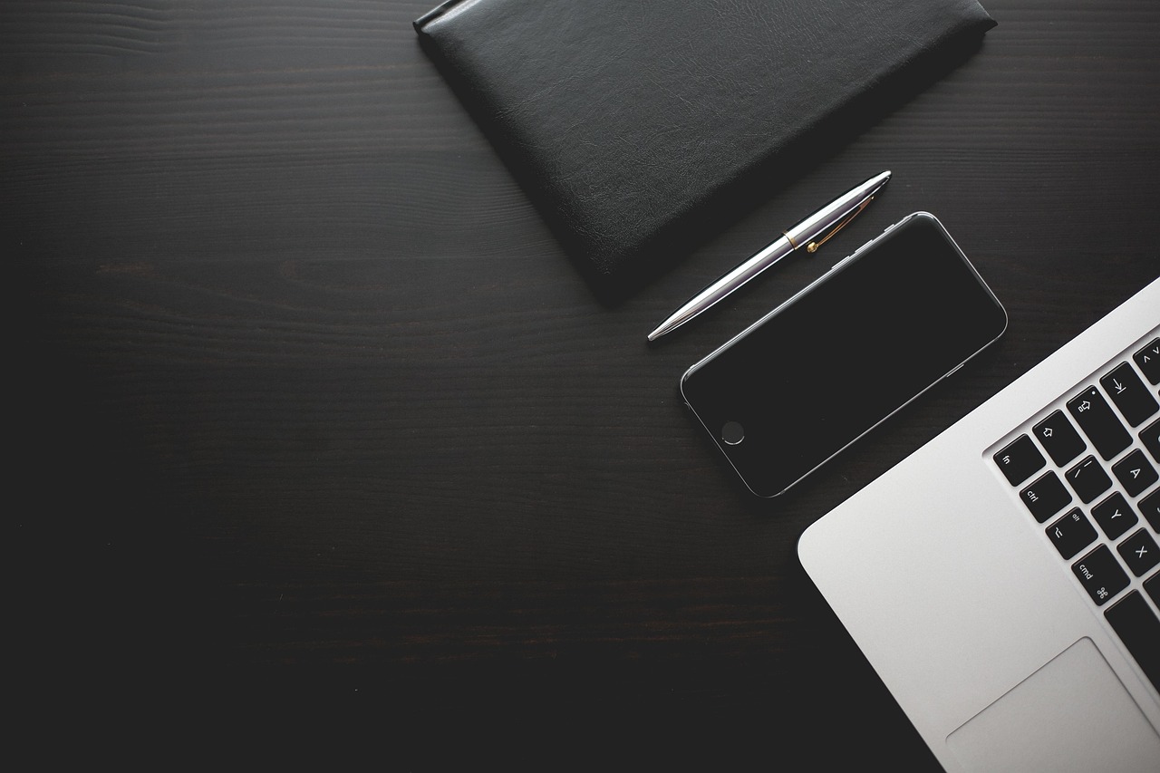 Office, desk, smartphone — Empowering Borrowers: Insights from Second Chance Loans Reviews